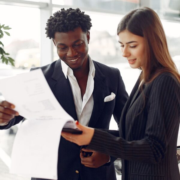 Two business people smiling